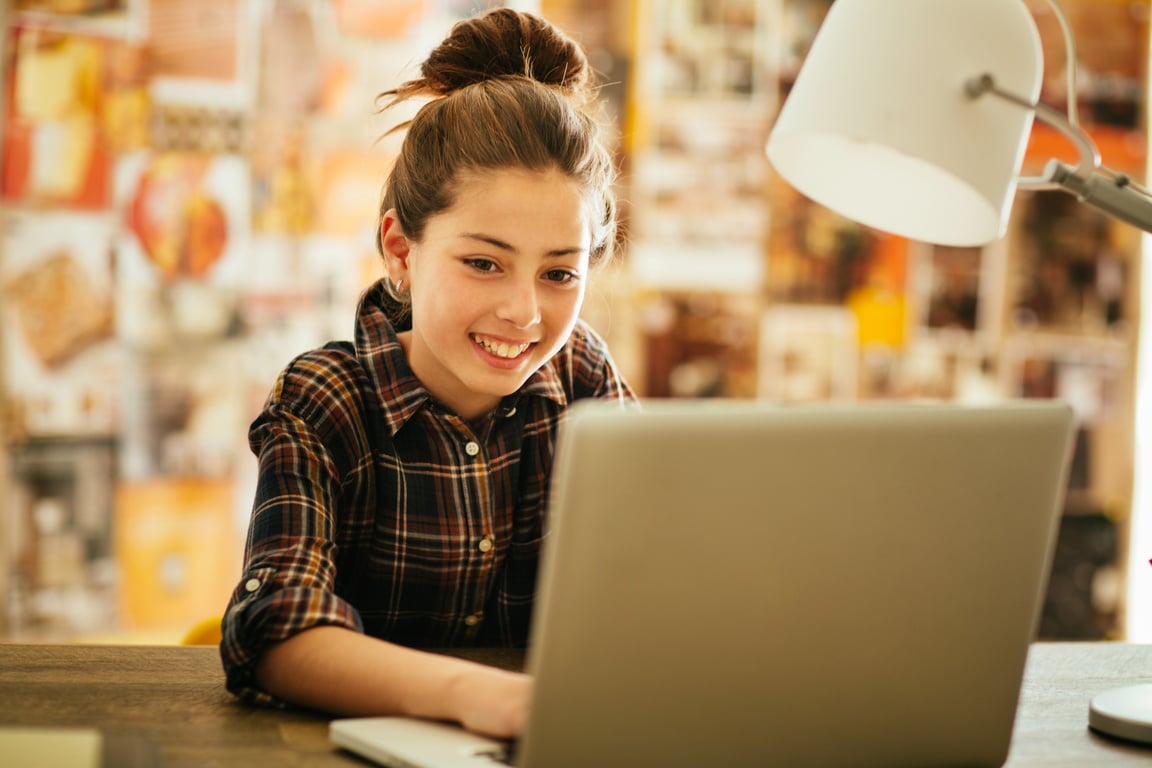 Pre-teen girl with laptop